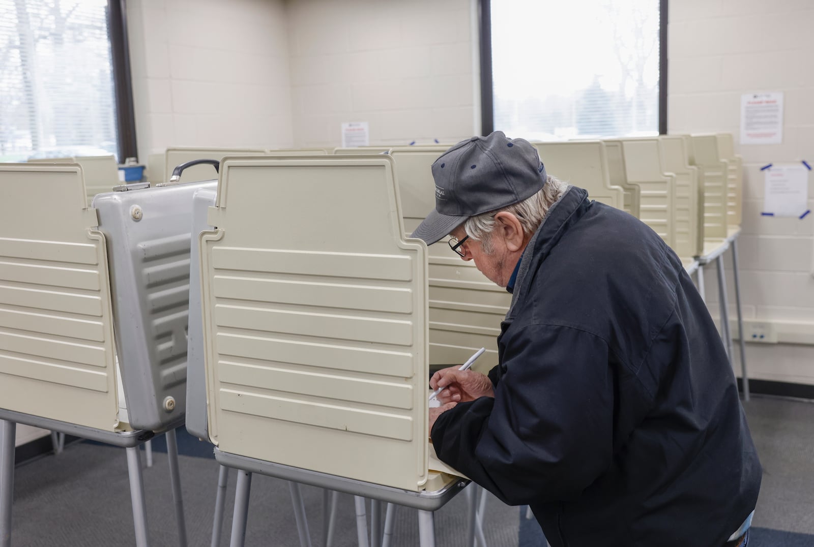 Roger Franks, of Clark County, votes in a booth at the Clark County Board of Elections on Wednesday, April 9, 2025. JOSEPH COOKE/STAFF