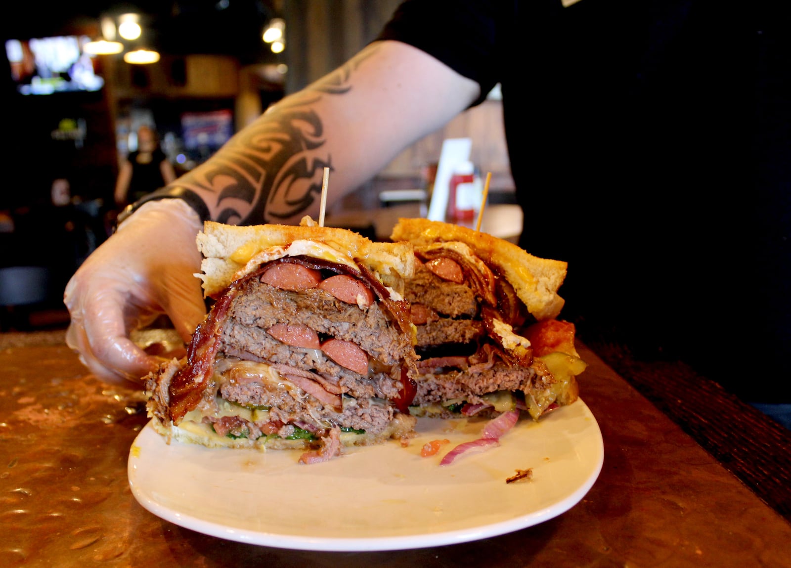Can you handle this Monster?  Wandering Griffin's Monster Burger is more than 2 pounds of cheese, meat and more cheese and meat.