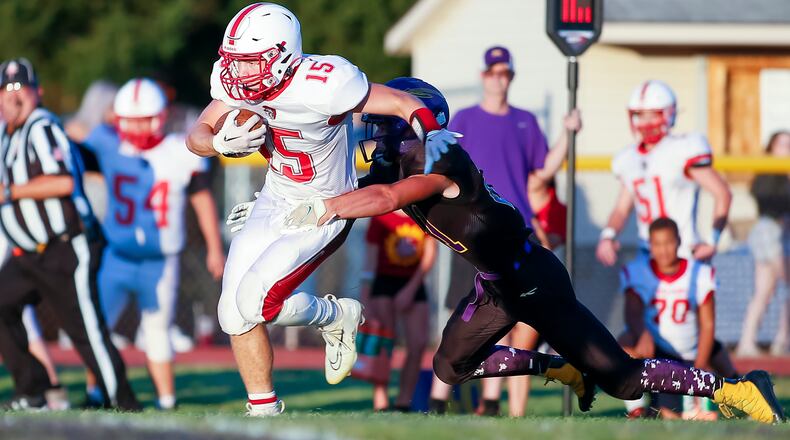Southeastern High School sophomore running back Hayden Davis runs the ball during their game at Mechanicsburg earlier this season. CONTRIBUTED PHOTO BY MICHAEL COOPER