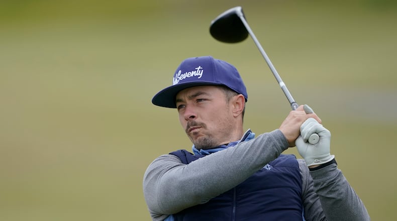 Danny Woodhead, a former NFL football running back, tees off on the first hole during a practice round for the U.S. Amateur Four-Ball golf championship, Friday, May 21, 2021, at Chambers Bay in University Place, Wash. The tournament is the first major USGA event hosted at the course since the 2015 U.S. Open. (AP Photo/Ted S. Warren)