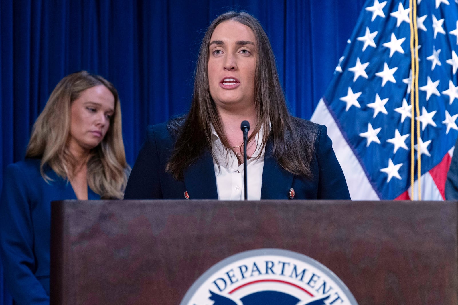 Deputy director of U.S. Immigration and Customs Enforcement Madison Sheahan speaks during a news conference at ICE Headquarters, in Washington, Wednesday, May 21, 2025. (AP Photo/Jose Luis Magana)