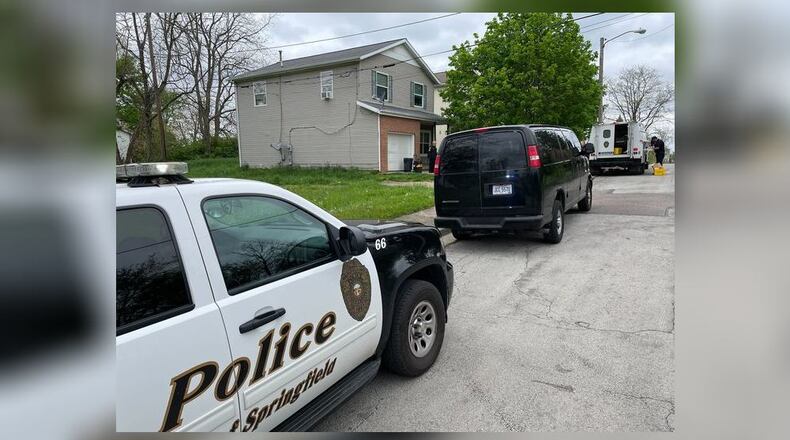 Springfield police raided a house Thursday, May 5, 2022, in the 400 block of Vine Street. BILL LACKEY/STAFF