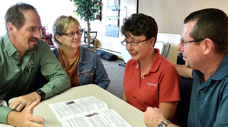 Chris and Amy Pruett, right, talk with the Marriage Resource Center’s Lavern and Rhonda Nissley in 2014. The resource center has now teamed up with Citi Lookout after some of its grants ended. Bill Lackey/Staff
