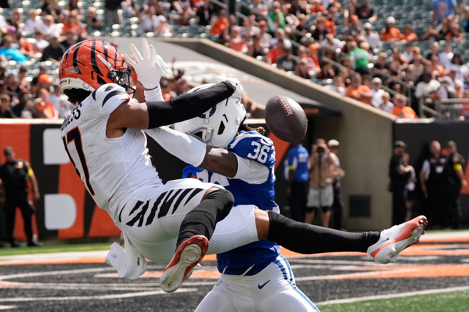 Indianapolis Colts' BJ Mayes (36) breaks up a pass intended for Cincinnati Bengals' Cole Burgess (17) during the second half of a preseason NFL football game, Saturday, Aug. 23, 2025, in Cincinnati. (AP Photo/Carolyn Kaster)