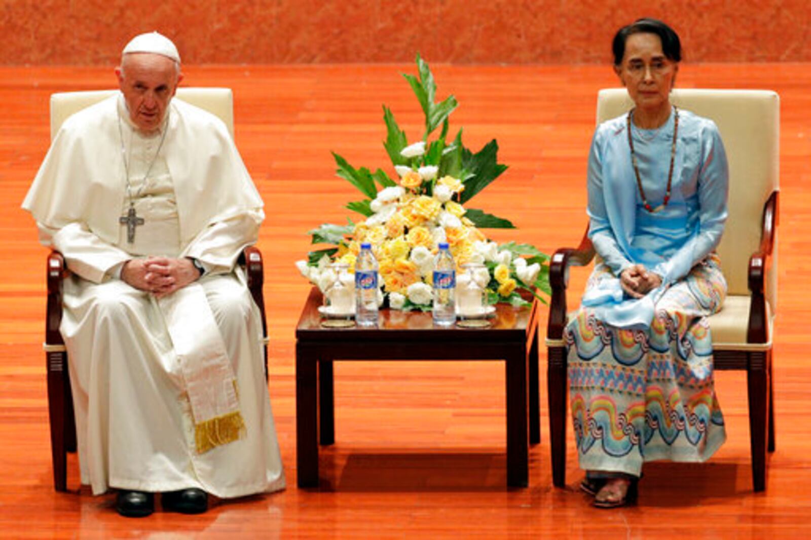 File - Pope Francis and Myanmar's leader Aung San Suu Kyi meet at the International Convention Centre of Naypyitaw, Myanmar, Tuesday, Nov. 28, 2017. (AP Photo/Andrew Medichini, file)