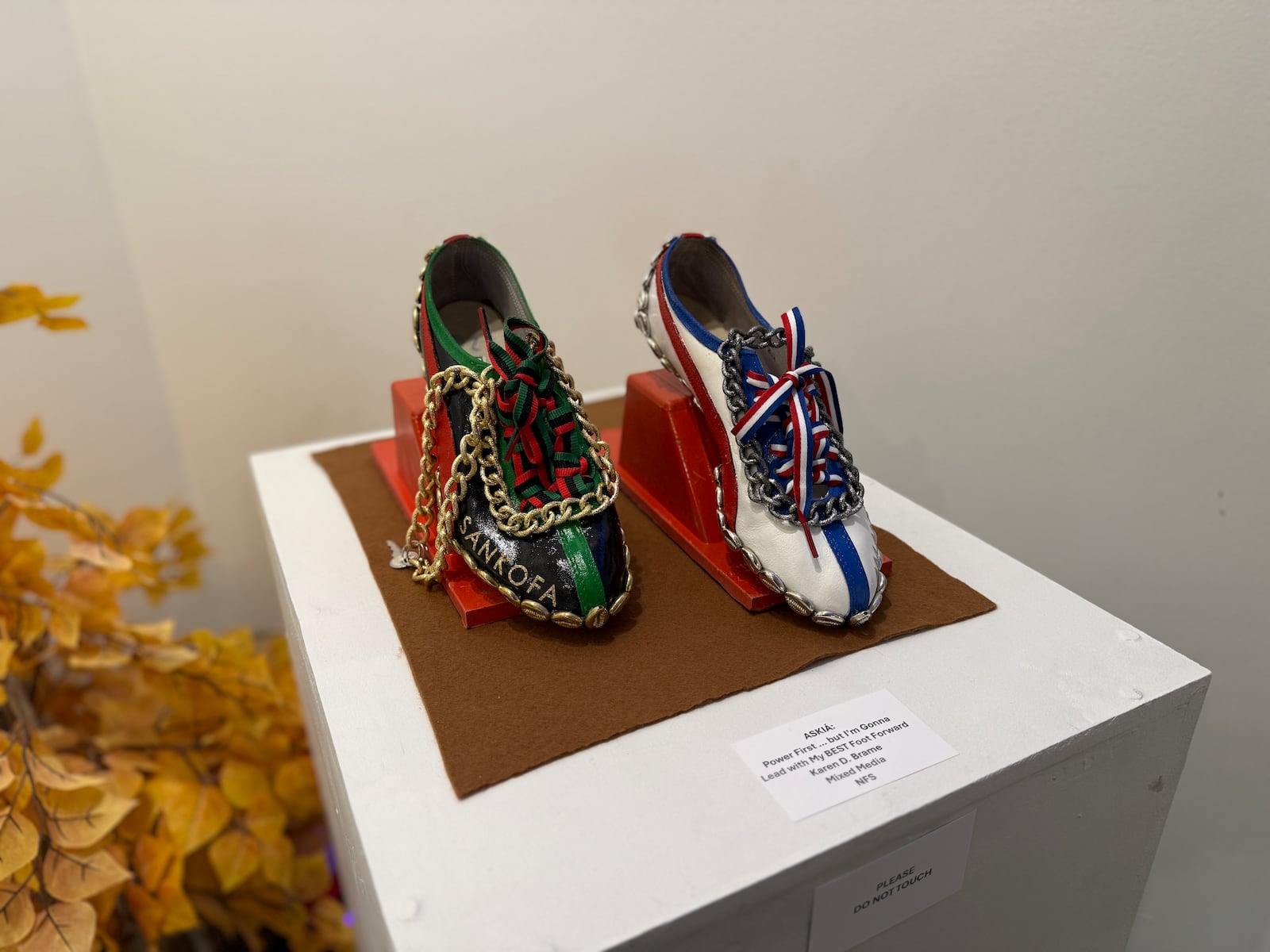 "ASKIA: Power First...but I'm Gonna Lead with My BEST Foot Forward" is a mixed media piece by Karen D. Brame. The sculpture honors Olympic track and field medalist Dr. John Carlos. HANNAH KASPER/CONTRIBUTED