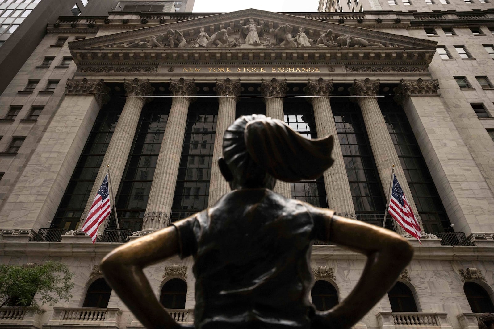 The "Fearless Girl" statue stands in front of the New York Stock Exchange, Wednesday, June 18, 2025, in New York. (AP Photo/Yuki Iwamura)