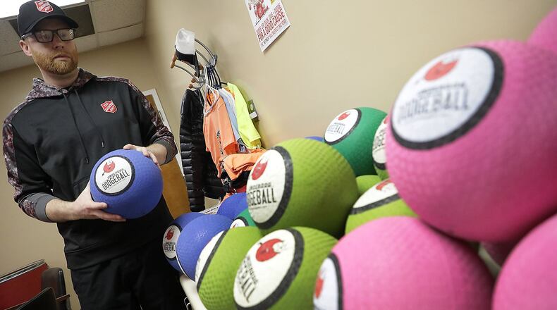 Ryan Ray, development director for the Springfield Salvation Army, gets ready for the Salvation Army’s annual dodgeball fundraiser. BILL LACKEY/STAFF