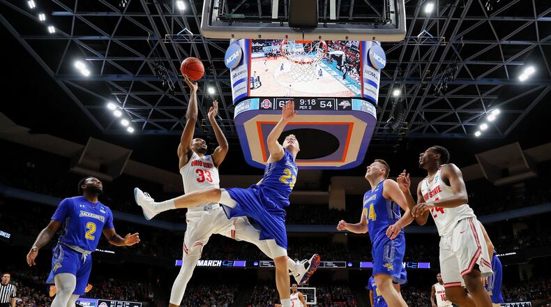 BOISE, ID - MARCH 15:  Keita Bates-Diop #33 of the Ohio State Buckeyes shoots the ball against Reed Tellinghuisen #23 of the South Dakota State Jackrabbits in the second half during the first round of the 2018 NCAA Men's Basketball Tournament at Taco Bell Arena on March 15, 2018 in Boise, Idaho.  (Photo by Ezra Shaw/Getty Images)