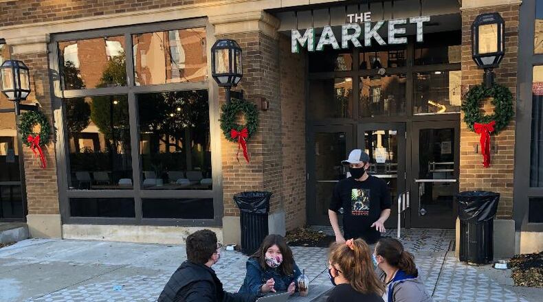 A new community service group for high school and middle school students, Bringing Awareness to Students, or B.A.T.S., will have its first event, "Capture Kindness Springfield" on Nov. 14 at COHatch. Members planning the event are, from left, Noah Chesshir, Maddie McCutcheon, COHatch employee Joel Shear, who will DJ the event, Addie Powell and Dina Rulli-Heaphey. Photo by Brett Turner