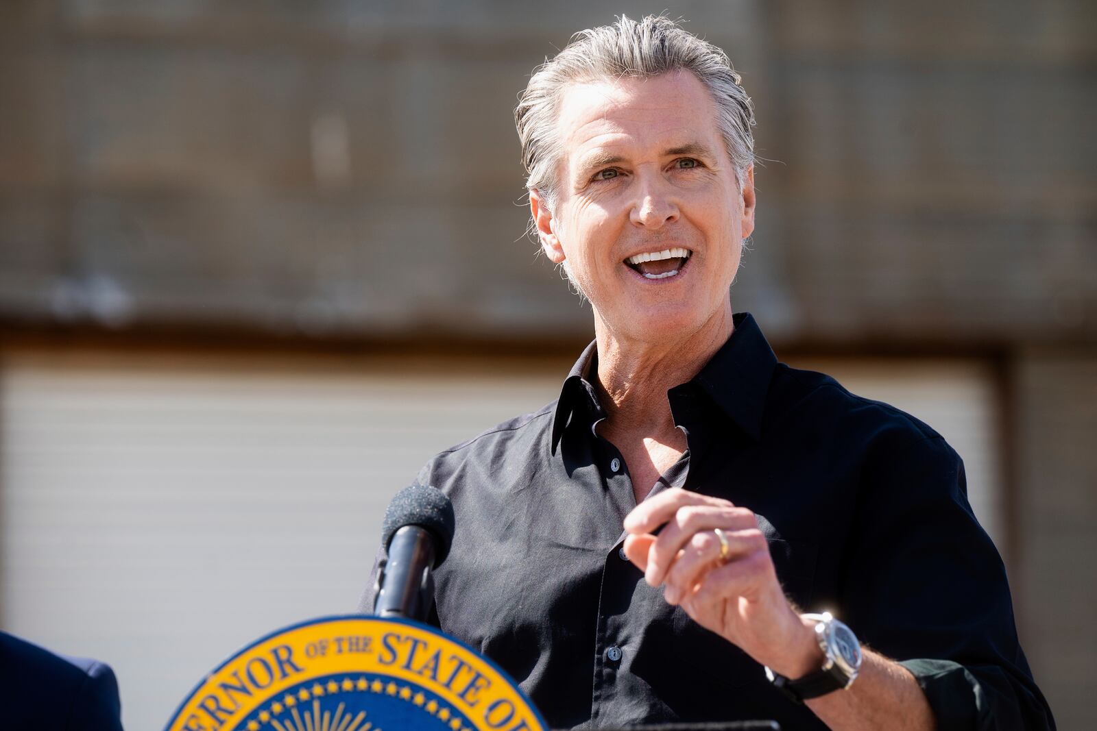 California Gov. Gavin Newsom discusses President Donald Trump's tariffs during a press conference on Wednesday, April 16, 2025, at an almond farm in Ceres, Calif. (AP Photo/Noah Berger)