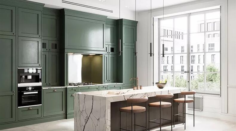 Painted kitchen cabinetry is making a comeback, like these painted forest green.