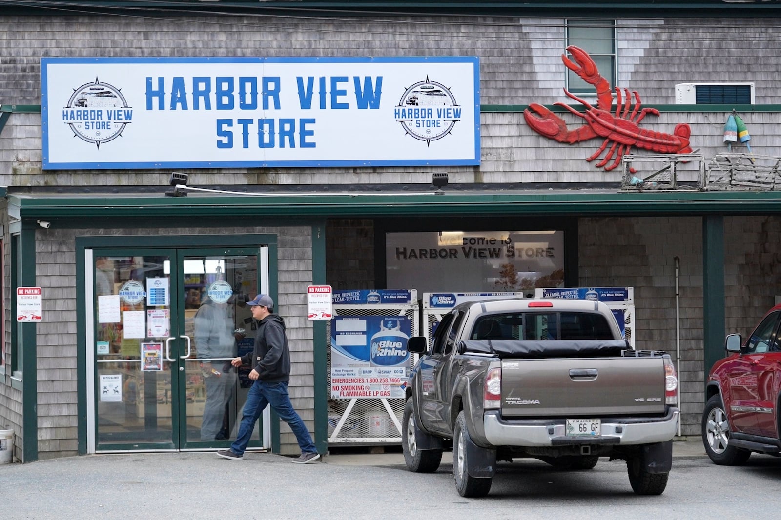 A lobster is part of the decorations at the Harbor View store in Stonington, Maine, on Friday, May 2, 2025. (AP Photo/Robert F. Bukaty)