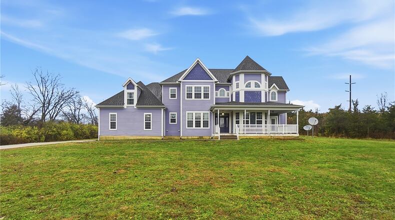 this Victorian style two story has a finished basement, three car garage, 6 bedrooms and 5,062 square feet of living space on slightly more than four acres. CONTRIBUTED