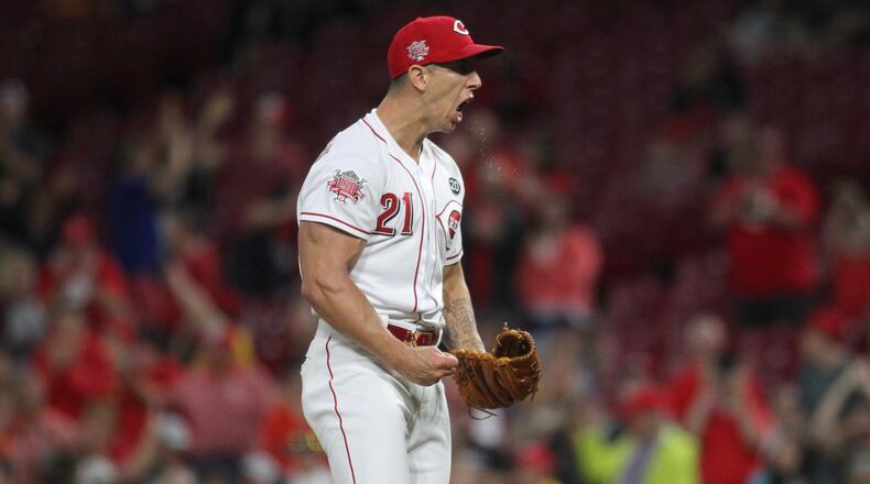 Reds reliever Michael Lorenzen reacts after the final out of a victory against the Astros on Monday, June 17, 2019, at Great American Ball Park in Cincinnati. David Jablonski/Staff