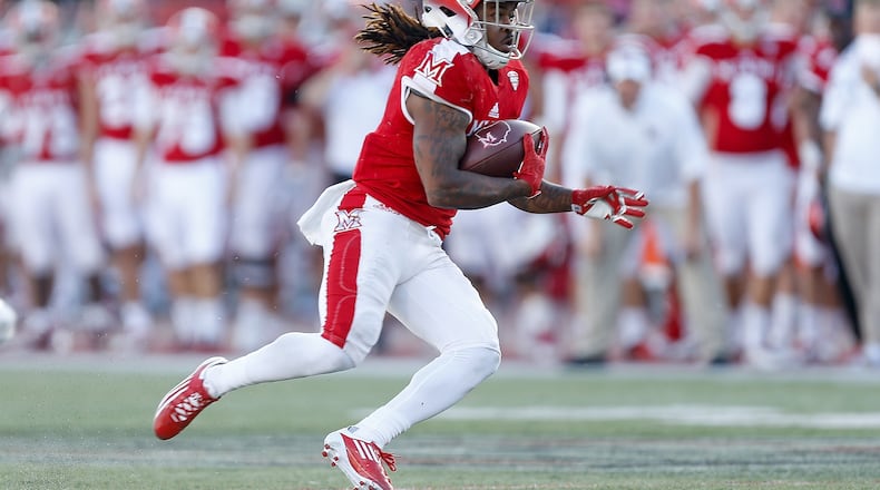 OXFORD, OH - OCTOBER 21: Kenny Young #3 of the Miami Ohio Redhawks runs with the ball after a reception against the Buffalo Bulls during the second half at Yager Stadium on October 21, 2017 in Oxford, Ohio. (Photo by Michael Reaves/Getty Images)