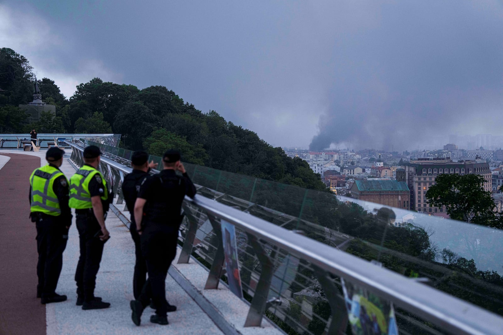 Smoke rises after Russian drone strike on Kyiv, Ukraine, Tuesday, June 10, 2025. (AP Photo/Evgeniy Maloletka)