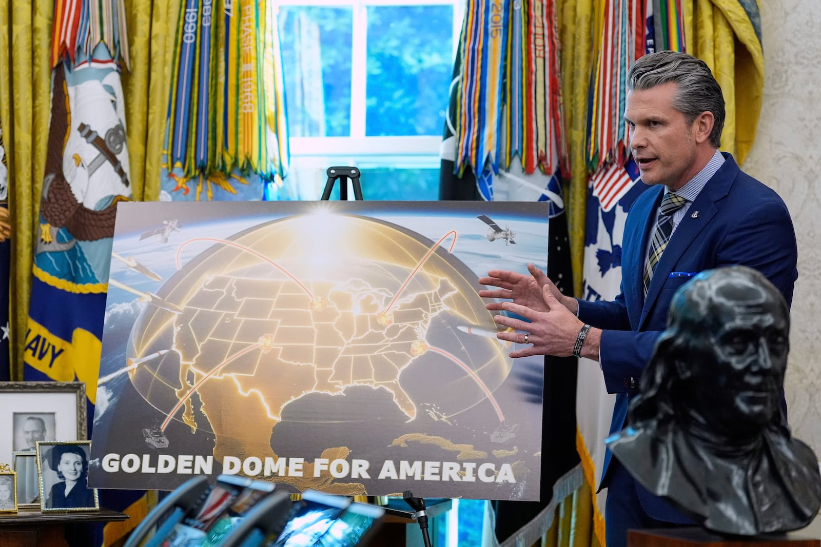 Defense Secretary Pete Hegseth speaks during an event with President Donald Trump in the Oval Office of the White House, Tuesday, May 20, 2025, in Washington. (AP Photo/Alex Brandon)
