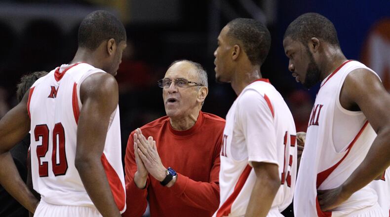 Miami University men's basketball coach Charlie Coles works with players during the 2011 MAC Tournament. Coles is being inducted into the Ohio Basketball Hall of Fame Saturday, May 21, 2011.