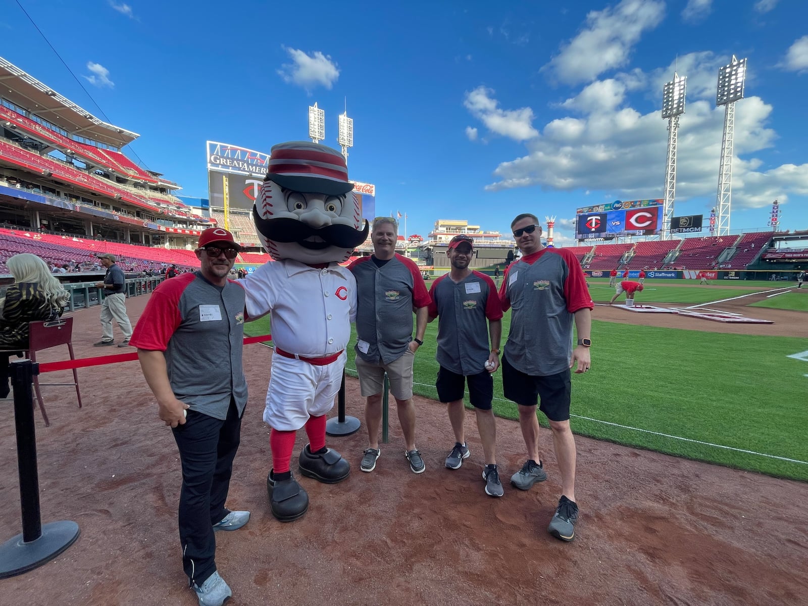 The Miracle Walk started in 2021 with one Fairfield man, Ben Otto, wanting to raise money for the Nuxhall Foundation's Hope Center project. Now in its fifth year, nearly 20 people will be walking with Otto, Eric Judd, Jared Baker and Tyler Parker (who participated in at least one of the first three walks) on Sept. 24, 2025, from Joe Nuxhall Miracle League Fields in Fairfield to Great American Ball Park in downtown Cincinnati. Pictured are Ben Otto, Jared Baker, Eric Judd and Tyler Parker, the first four Miracle Walkers at Great American Ball Park in 2023. PROVIDED