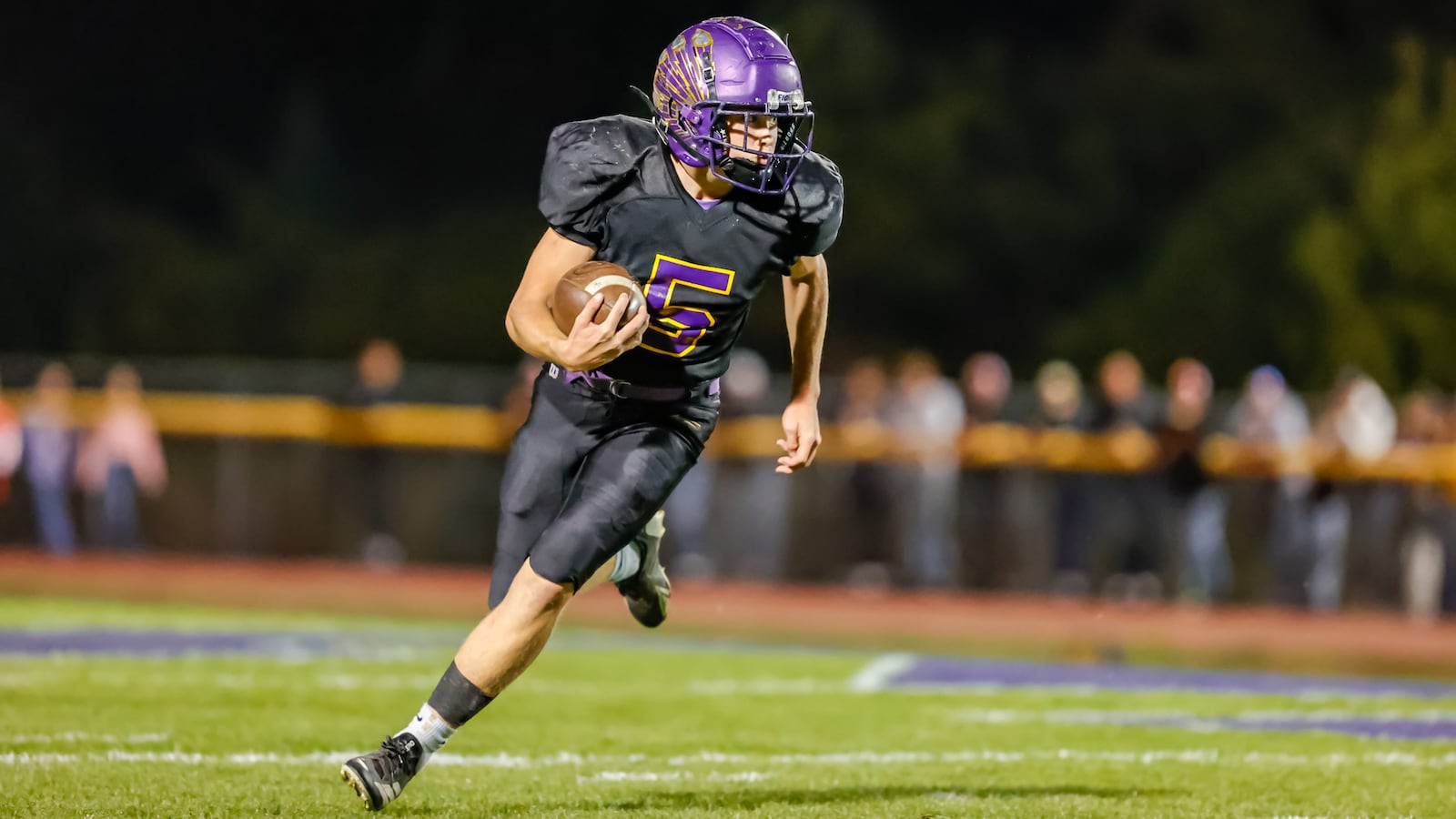 Mechanicsburg High School sophomore Matthew Davis runs during their game against Northeastern on Friday, Oct. 17 at Indian Stadium. Northeastern won 52-36. MICHAEL COOPER / STAFF