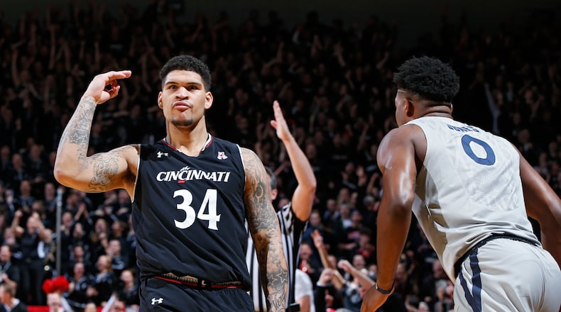 CINCINNATI, OH - JANUARY 26: Jarron Cumberland #34 of the Cincinnati Bearcats reacts after making a three-point basket against the Xavier Musketeers in the second half of the game at Fifth Third Arena on January 26, 2017 in Cincinnati, Ohio. Cincinnati defeated Xavier 86-78. (Photo by Joe Robbins/Getty Images)