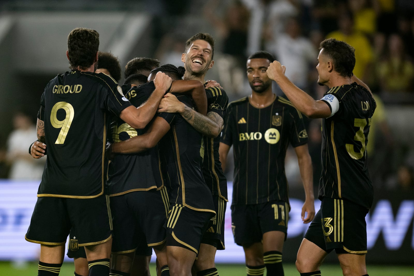 Los Angeles FC players celebrate a goal by Igor Jesus during the second half of a FIFA Club World Cup play-in soccer match against the Club América, Saturday, May 31, 2025, in Los Angeles. (AP Photo/Kyusung Gong)