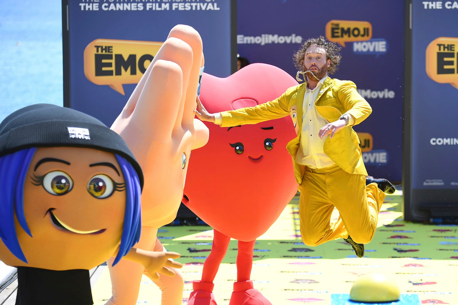 FILE - Actor T. J. Miller poses with characters during the photo call for the film The Emoji Movie, at the 70th international film festival, Cannes, southern France, Tuesday, May 16, 2017. (Photo by Arthur Mola/Invision/AP, File)
