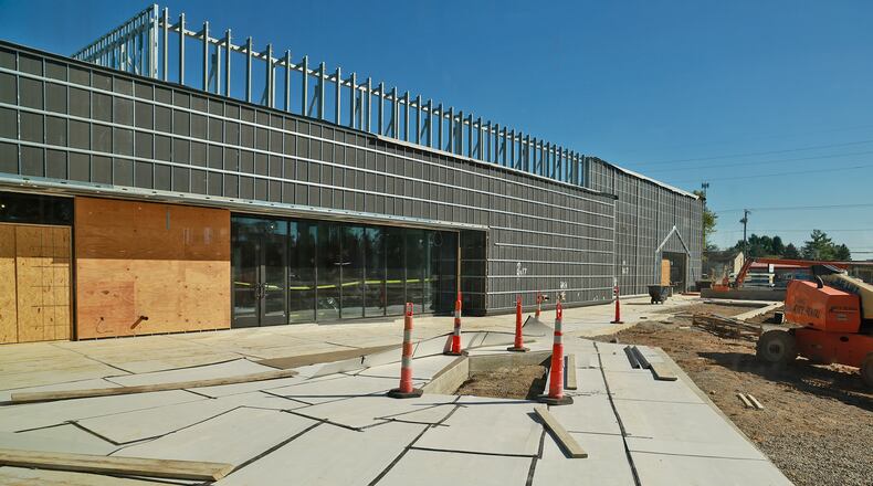Members of the Global Impact STEM Academy Board of Directors took a tour of the school's new Upper Academy under construction on the Clark State College Leffel Lane campus Tuesday, Oct. 8, 2024. BILL LACKEY/STAFF