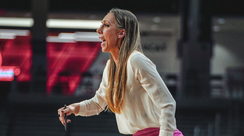Melissa Kolbe, the new Wittenberg women's basketball coach, coaches for the Cincinnati Bearcats. Photo courtesy of the University of Cincinnati