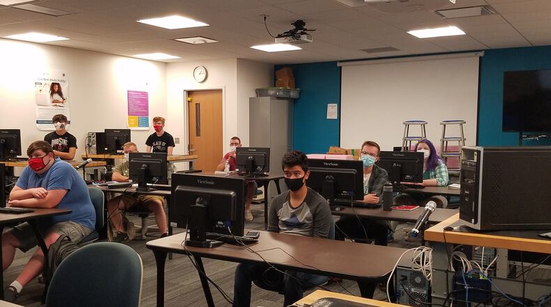 Clark State College’s cybersecurity associate degree program has been named a Center of Academic Excellence through 2028. In this file photo is students in the cybersecurity lab class in 2020 on the first day of fall semester. FILE/CONTRIBUTED