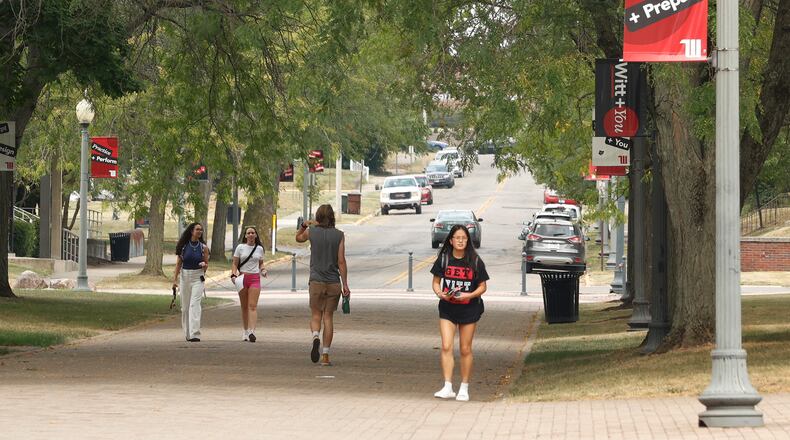 Students walk across the Wittenberg University campus Friday, Sept. 6, 2024. BILL LACKEY/STAFF