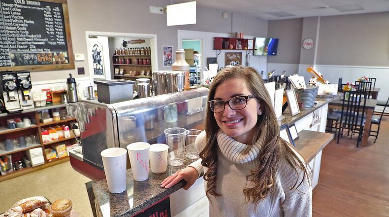Bobbi McKee, owner of The Spotted Cow Coffeehouse and the upcoming Spotted Owl shop. BILL LACKEY/STAFF
