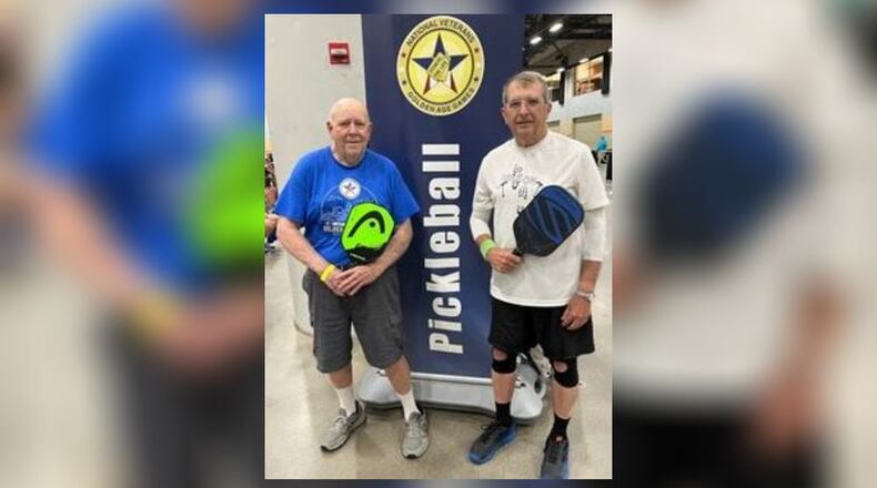 Dan Shroyer (left), a retired insurance agent, and Dr. John Eichelberger (right), a retired dentist, both Springfield men, became qualified, competed and claimed gold medals in their respective age brackets in the National Veterans Golden Age Games (NVGAG).