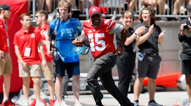 Archie Griffin runs for a touchdown during a ceremonial play during Ohio State's NCAA college football Spring game Saturday, April 15, 2023, in Columbus, Ohio. (AP Photo/Jay LaPrete)
