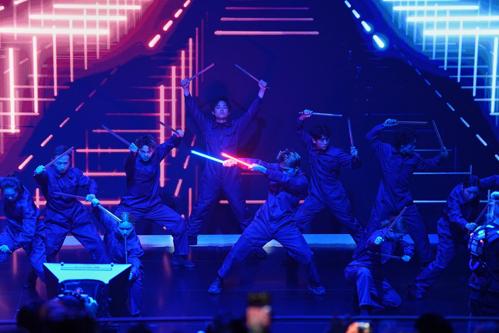 Performers take part in the Volkswagen Group media night ahead of the Auto Show in Shanghai, Tuesday, April 22, 2025. (AP Photo/Ng Han Guan)