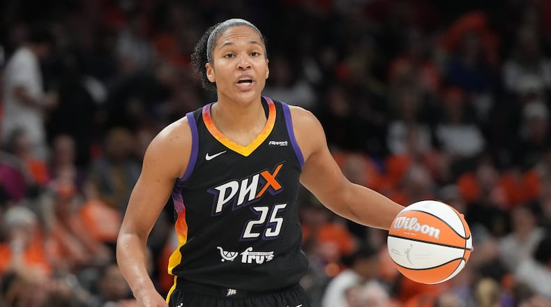 FILE - Phoenix Mercury forward Alyssa Thomas (25) drives against the Las Vegas Aces during the first half of Game 3 of the WNBA basketball finals, Wednesday, Oct. 8, 2025, in Phoenix. (AP Photo/Rick Scuteri, File)