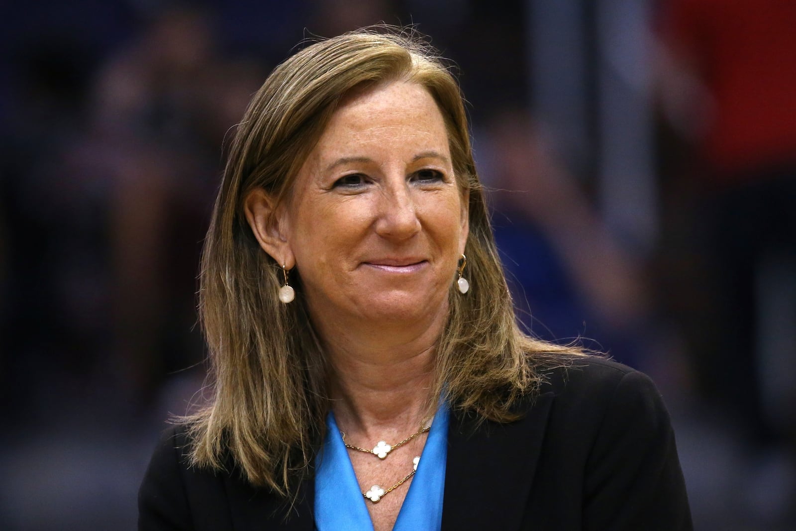 FILE - WNBA Commissioner Cathy Engelbert is honored during a Women of Inspiration ceremony during halftime of a WNBA basketball game between the Phoenix Mercury and the Seattle Storm, Sept. 3, 2019, in Phoenix. (AP Photo/Ross D. Franklin, file)