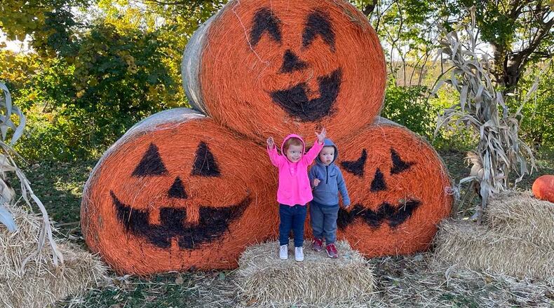Twins from Springfield, Stella and Holden Lynch, pose for Halloween photos at Old Thyme Growers. Photos by Pam Cottrel