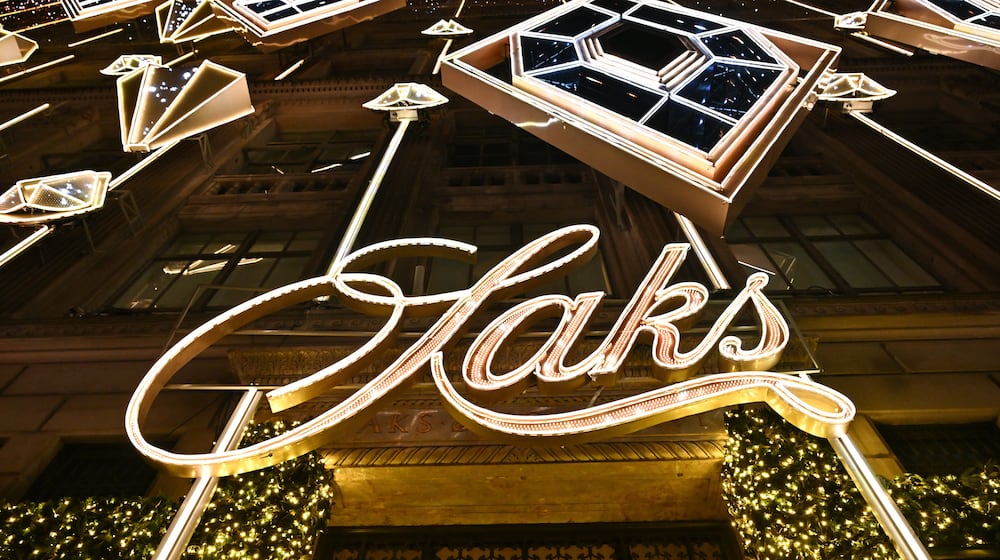 FILE - Holiday decorations are displayed during Saks Fifth Avenue's holiday light show and window reveal, Nov. 24, 2025, in New York. (Photo by Evan Agostini/Invision/AP, File)