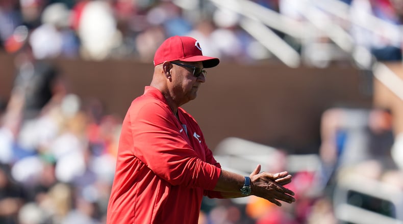 Cincinnati Reds manager Terry Francona walks to the pitcher's mound to replace Reds starting pitcher Andrew Abbott during the third inning of a spring training baseball game against the San Francisco Giants Friday, March 6, 2026, in Scottsdale, Ariz. (AP Photo/Ross D. Franklin)