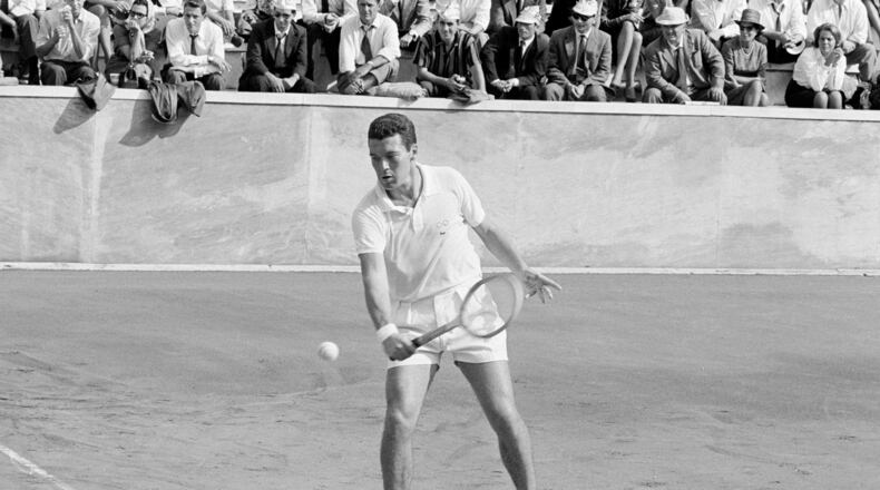 FILE - Italy's Nicola Pietrangeli in action during his Davis Cup singles tennis match against United States' Jon Douglas, in Rome, Oct. 16, 1961. (AP Photo/Mario Torrisi, File)