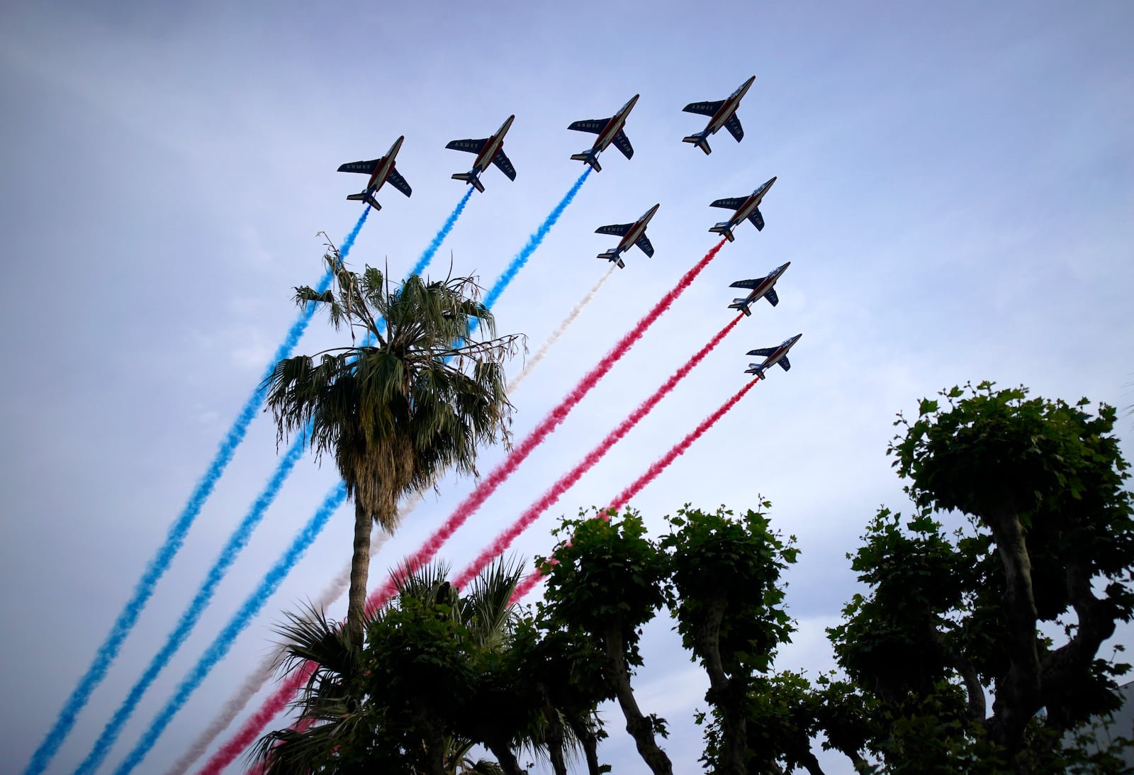 FILE - French Alpha Jets Patrouille de France fly over the premiere of the film 'Top Gun: Maverick' at the 75th international film festival, Cannes, southern France, Wednesday, May 18, 2022, File. (AP Photo/Daniel Cole)