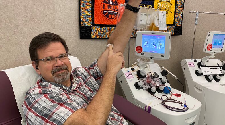 Monroe donor Jim Bachmann is a robotic automation engineer who knows no matter how strong a mechanical robot arm may be, it’s useless for giving the gift of life. Bachman is a blood type AB positive universal plasma and platelet donor who rolled up his sleeve for his milestone 100th lifetime donation April 21 at the Dayton Blood Center. Bachman works in automation solutions for Gosiger in Dayton. He donated platelets and plasma throughout the pandemic, made 17 donations in 2022, and reached his 100th donation with his fifth donation of the year. CONTRIBUTED