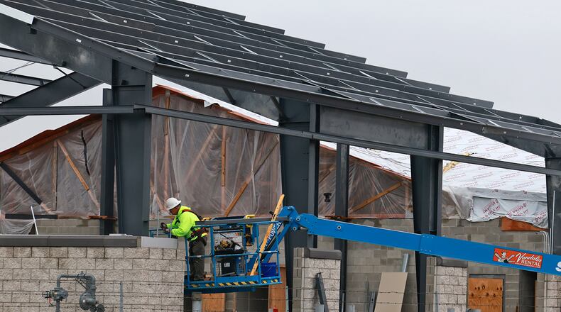 Crews from Marker Construction continue to work on the Springfield Fire Rescue Division's new Fire Station #6 Wednesday, Nov. 6, 2024. The steel frame for the truck bays was recently erected. The new station, which will also house a police substation, is supposed to be finished in April 2025. BILL LACKEY/STAFF