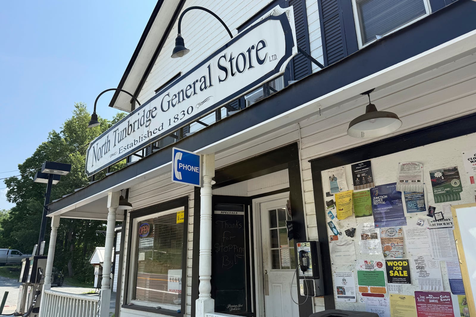 A phone installed by engineer Patrick Schlott is pictured outside the North Tunbridge General Store on Wednesday, July 16, 2025, in Tunbridge, Vt. (AP Photo/Amanda Swinhart)