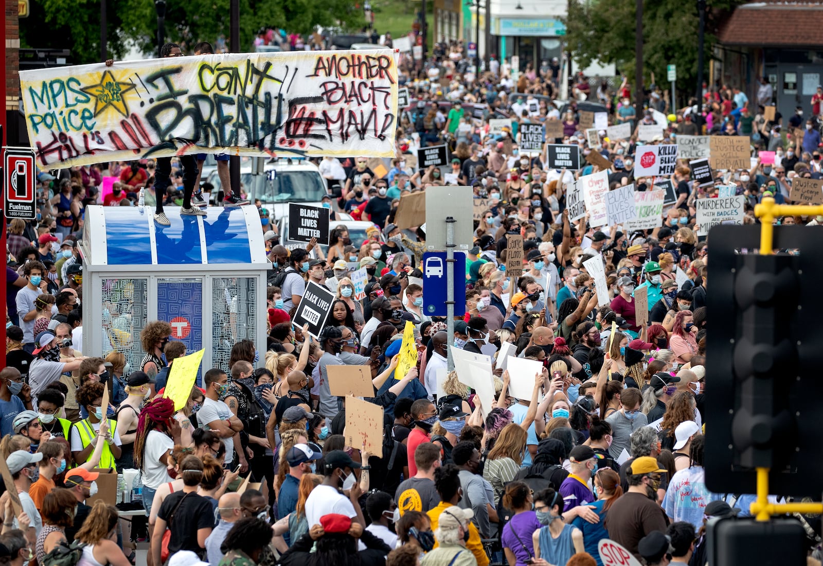 FILE - Protesters gather calling for justice for George Floyd on Tuesday, May 26, 2020, in Minneapolis. Four Minneapolis officers involved in the arrest of Floyd, a black man who died in police custody, were fired Tuesday, hours after a bystander's video showed an officer kneeling on the handcuffed man's neck, even after he pleaded that he could not breathe and stopped moving. (Carlos Gonzalez/Star Tribune via AP, file)