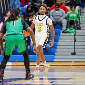 The Northmont High School boys basketball team overcame a 16-point first half deficit to beat Springfield 68-60 on Friday night at Springfield High School. MICHAEL COOPER / STAFF