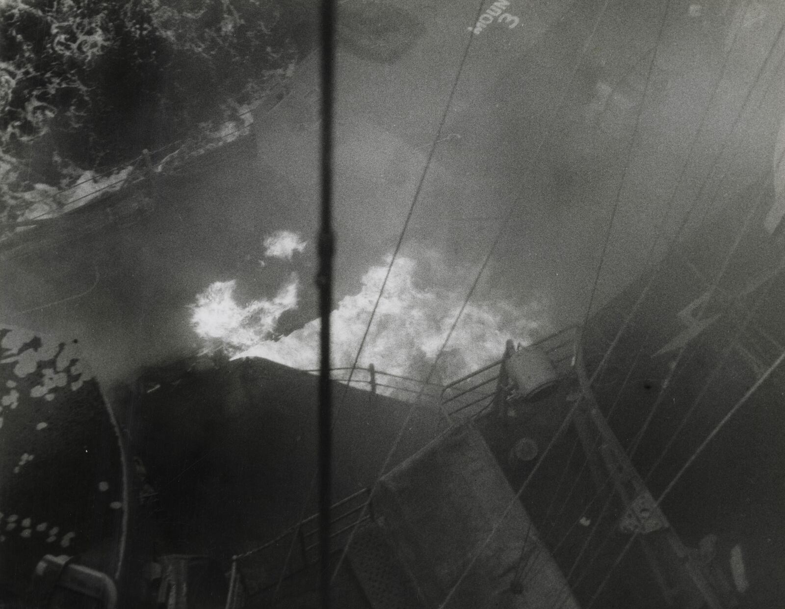 This image provided by the U.S. National Archives shows a fire after a Japanese Zero fighter plane hit the USS Missouri that was operating off Okinawa, Japan, on April 11, 1945. (U.S. National Archives photo no. 80-G-273968 via AP)