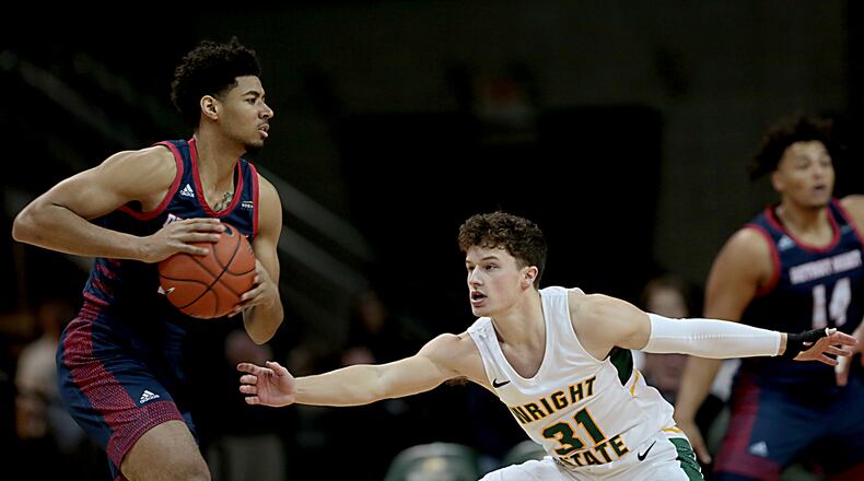Wright State University guard Cole Gentry covers Detroit Mercy forward Alonde LeGrand during their Horizon League game at the Nutter Center in Fairborn Thursday, Feb. 6, 2020. Wright State won 98-86. Contributed photo by E.L. Hubbard